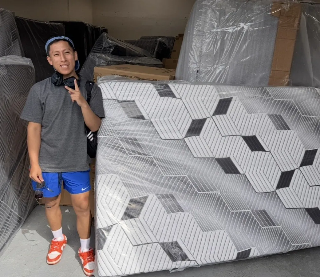 Customer picking up a new mattress at our Elk Grove store