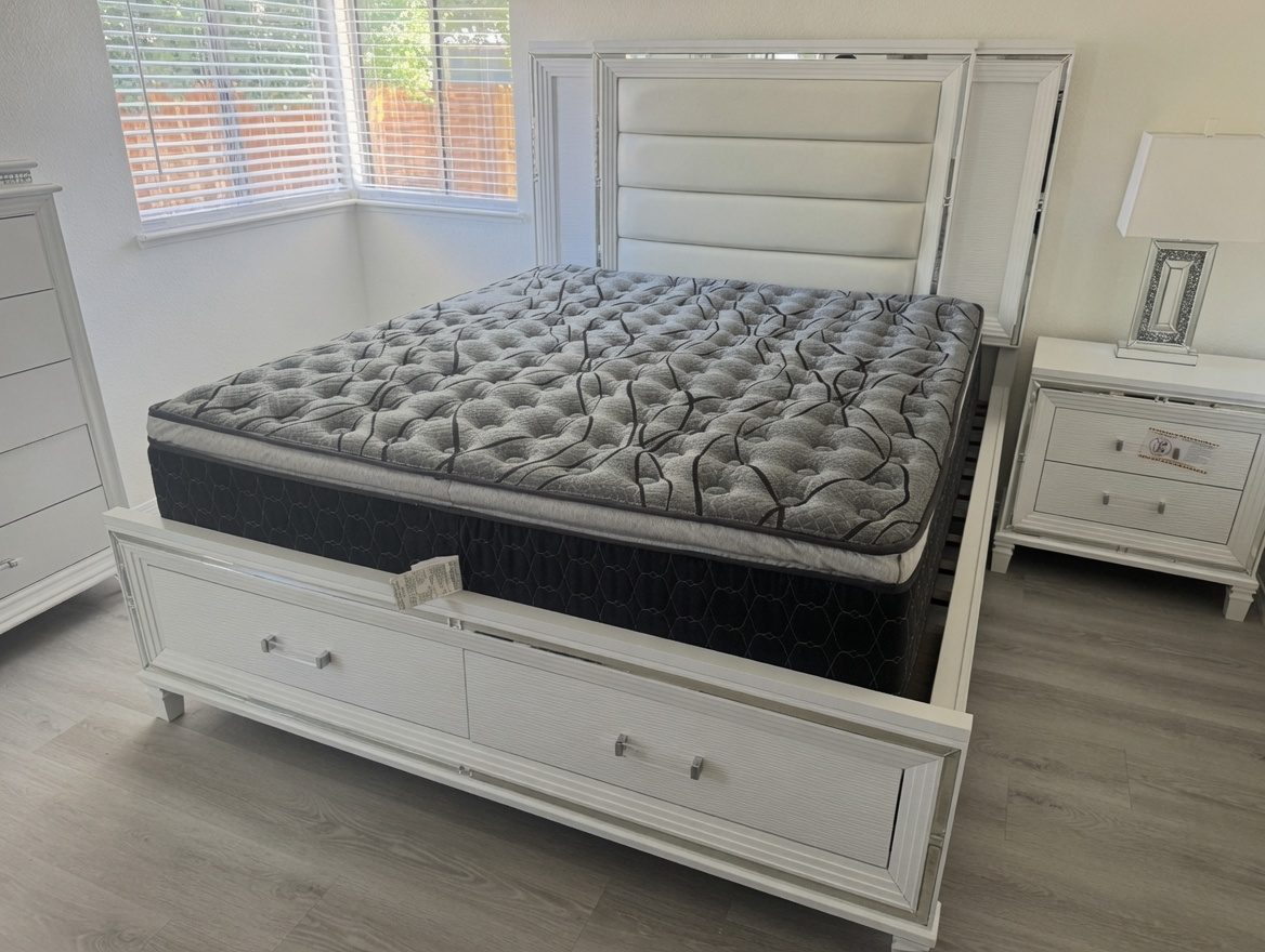 Premium queen mattress on a white storage bedroom set — a queen mattress Elk Grove deal at warehouse prices